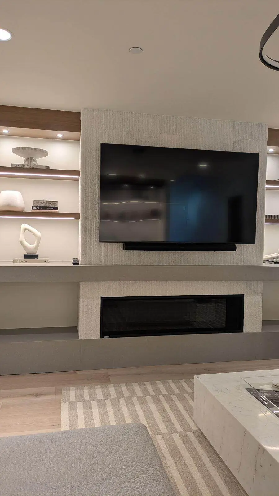 Custom stone fireplace and built-in surround