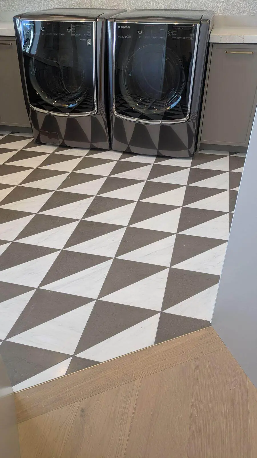 Custom diamond-pattern tile flooring installation